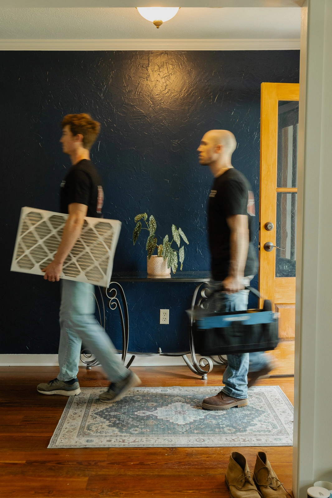 AC repair service technicians working in home with tools and filter